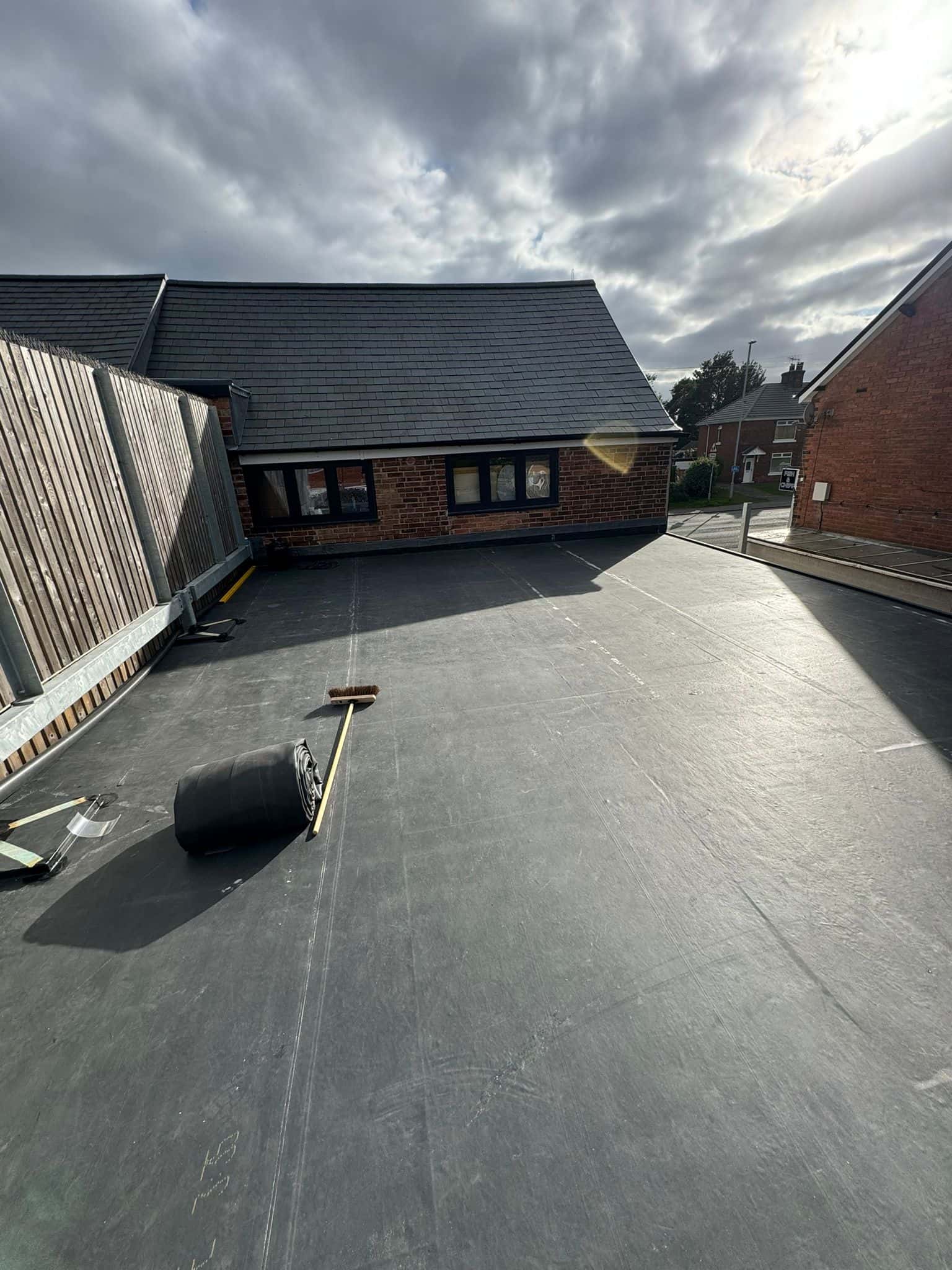 Completed Firestone EPDM rubber flat roof on a garage