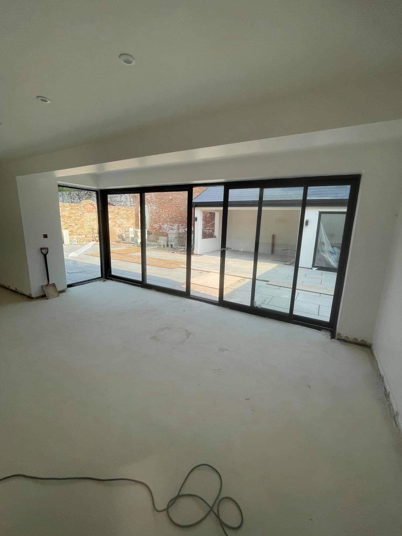 Bifold doors installed by WeatherTech Roofing in Mansfield