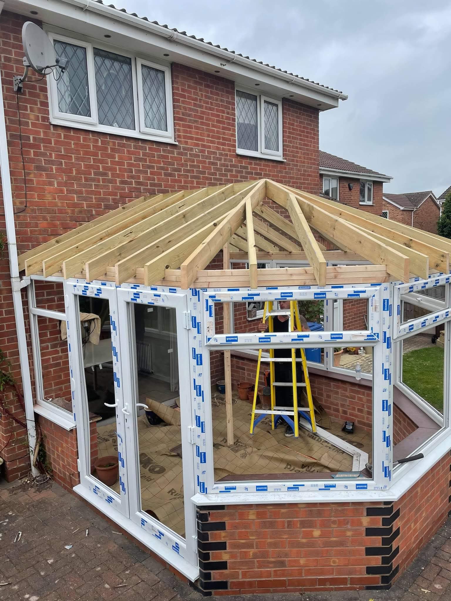 New timber warm-roof structure going on during the conversion