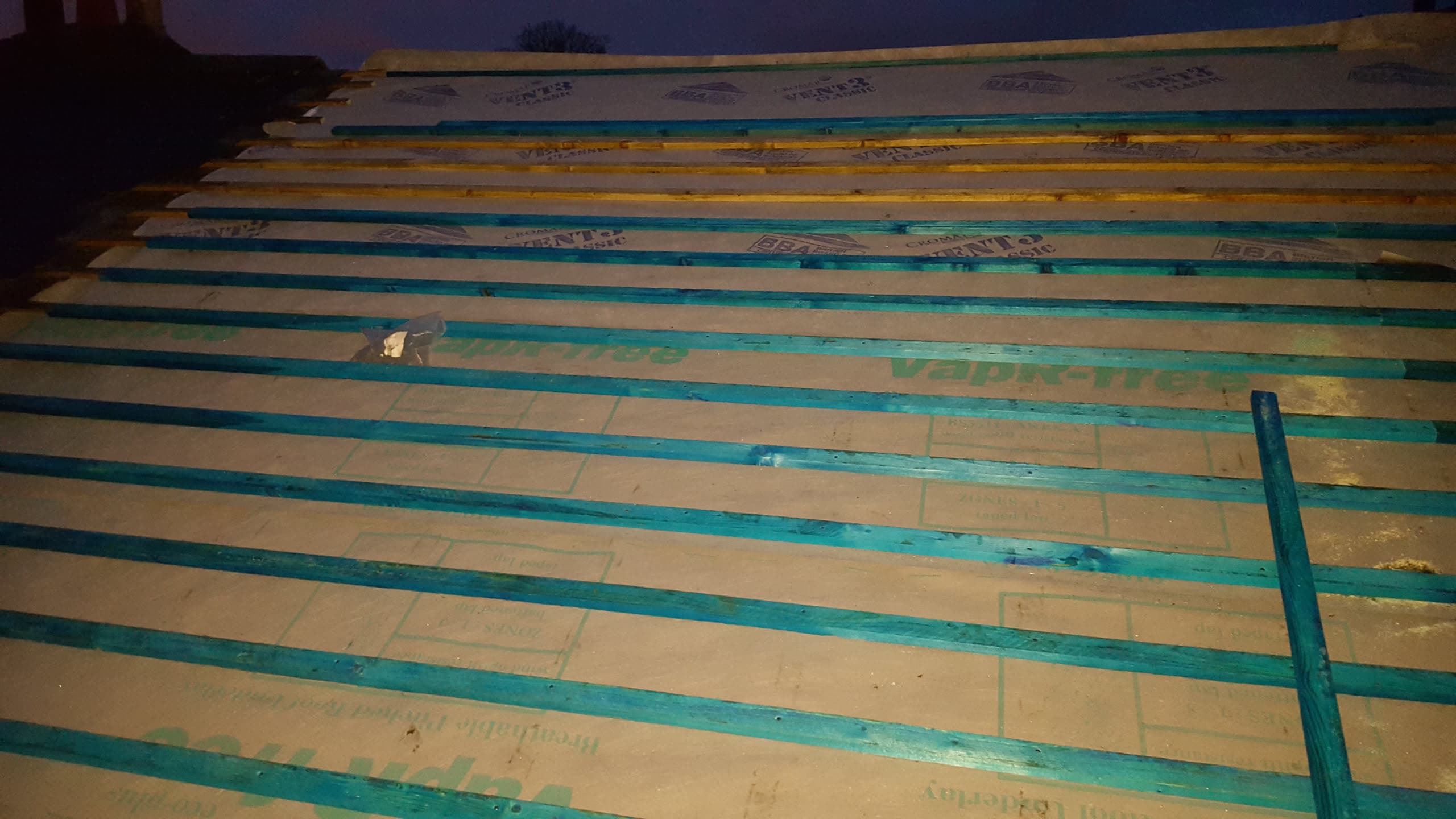 Pitched roof with timber battens and breathable membrane ready for tiling
