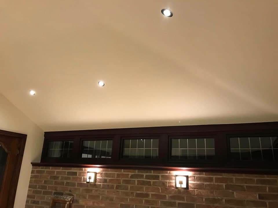 Interior ceiling with recessed spotlights and cream finish