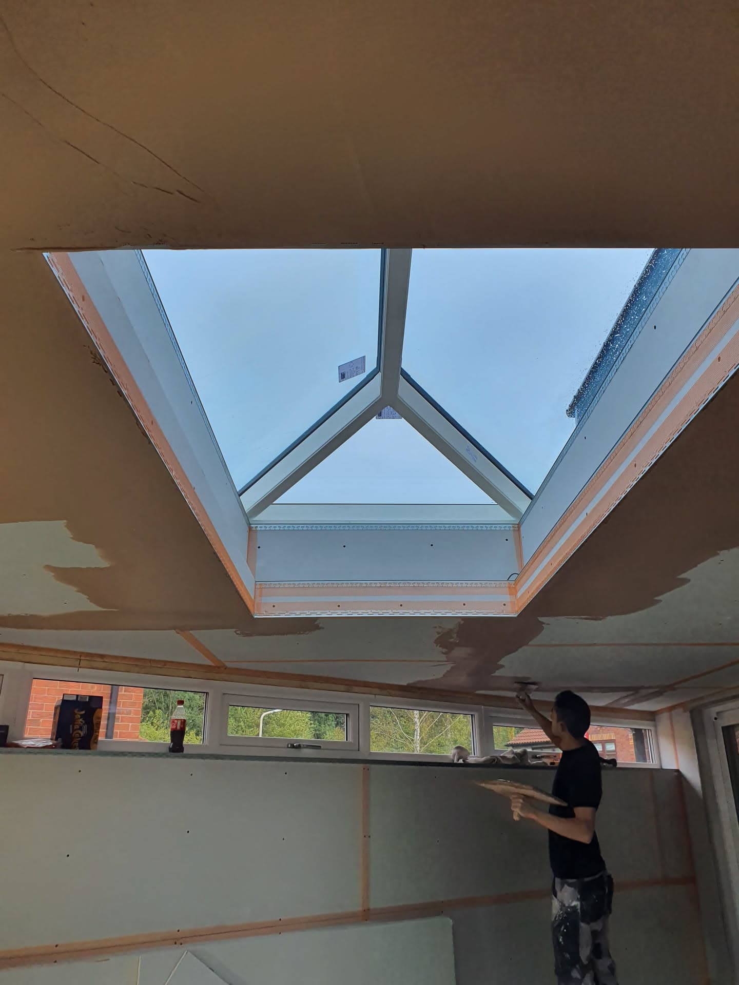Interior view of newly installed roof lantern with glazed panels and timber frame