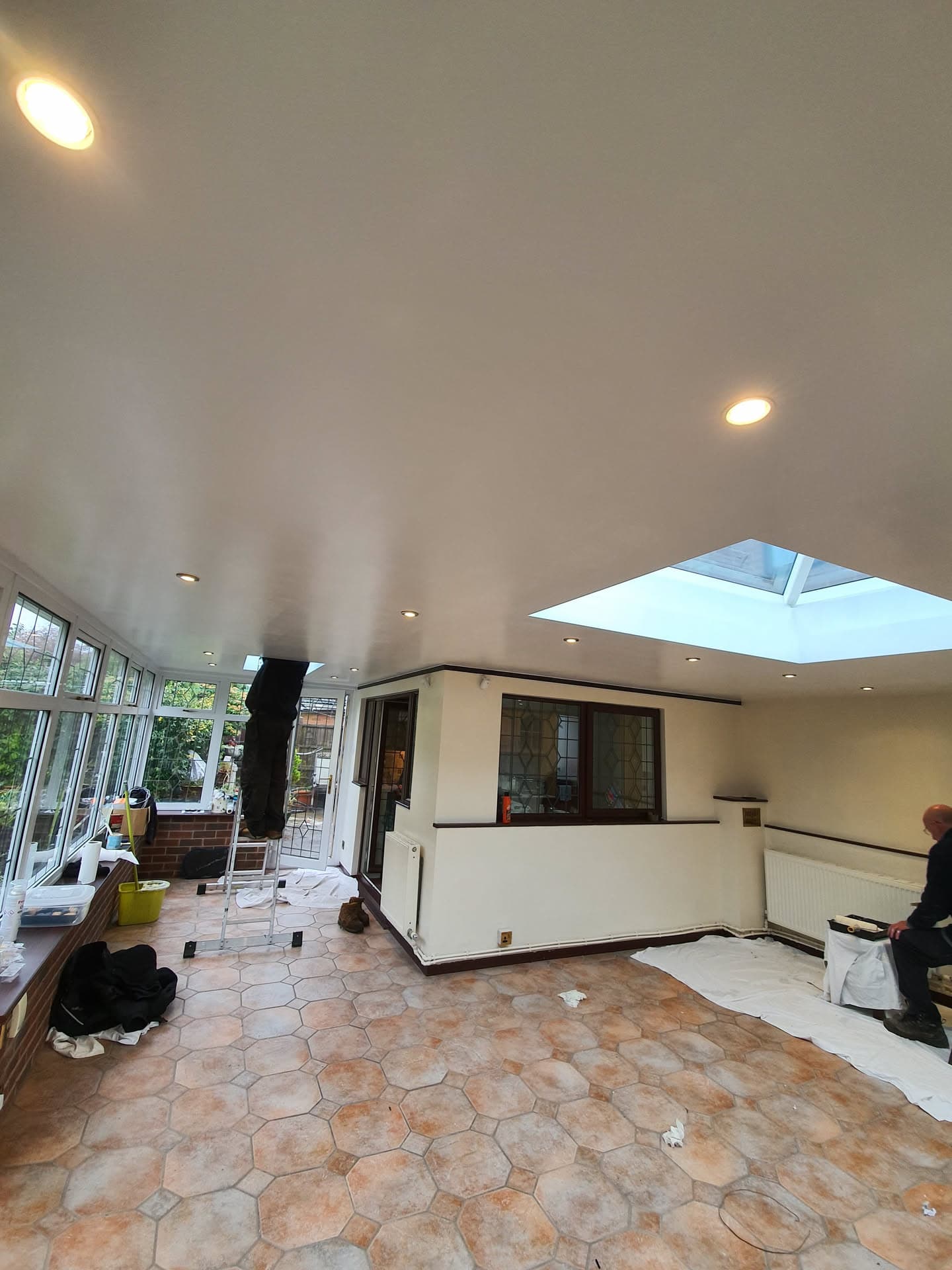 Interior view of conservatory extension with glazed lantern roof and recessed ceiling lights