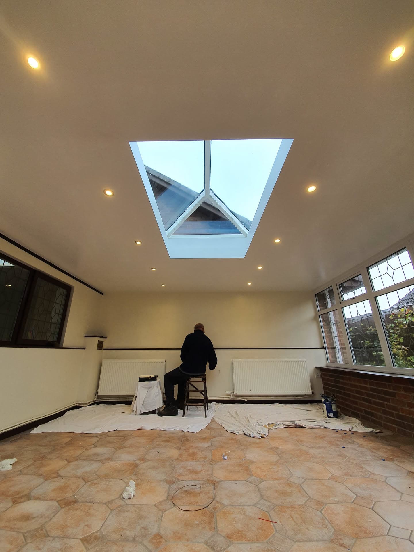 Interior view of completed conservatory roof lantern with white uPVC frame and glazed panels