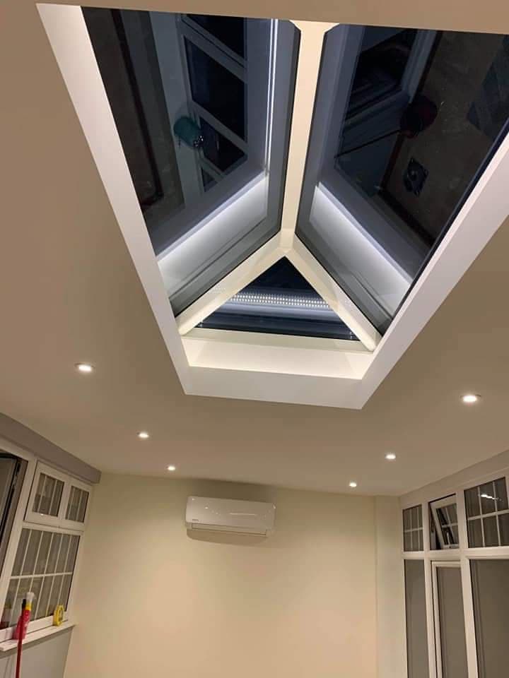 Conservatory roof lantern with white uPVC frame and grey glazing bars viewed from inside