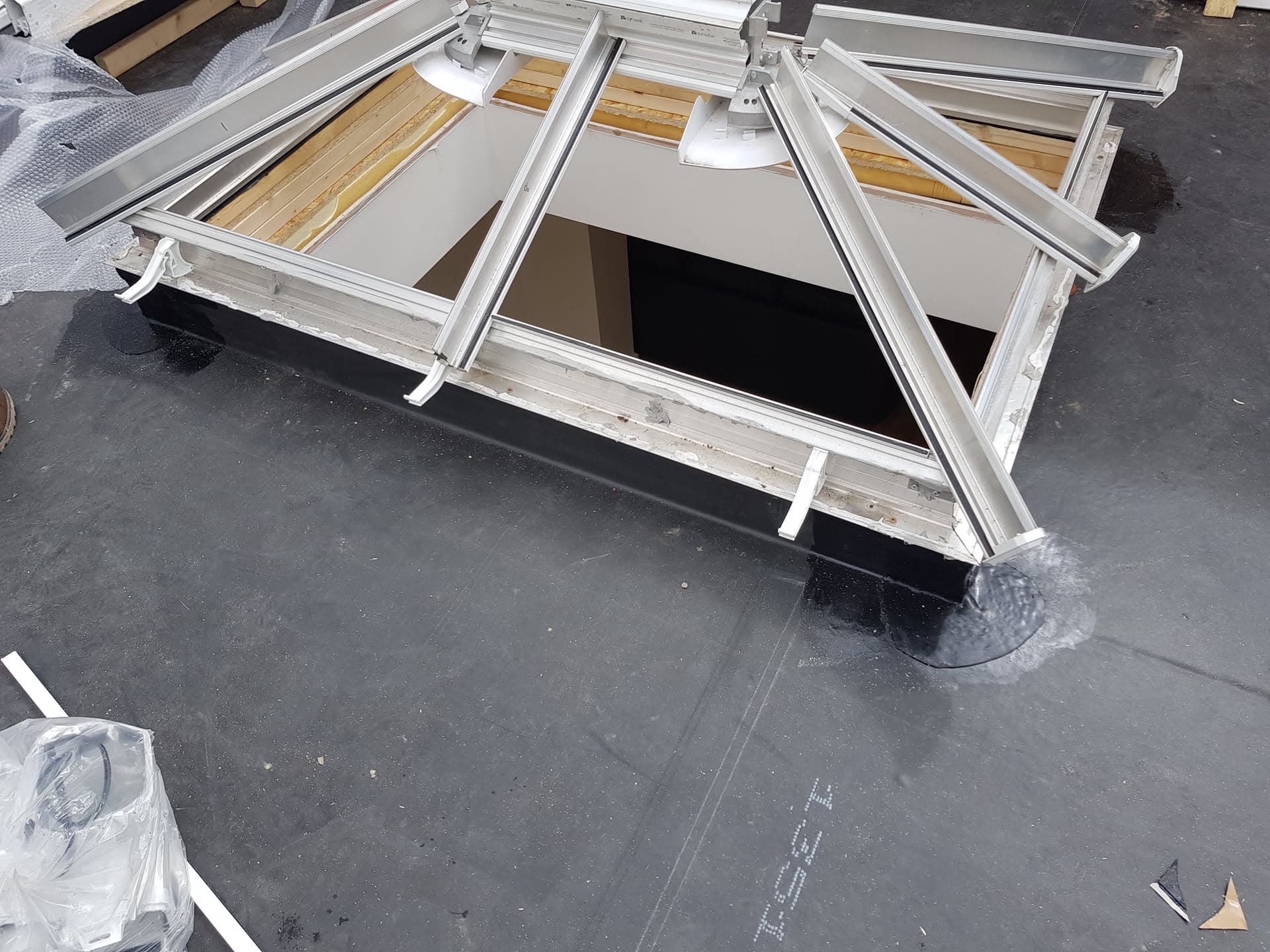 White uPVC roof lantern installed on flat roof with EPDM rubber membrane