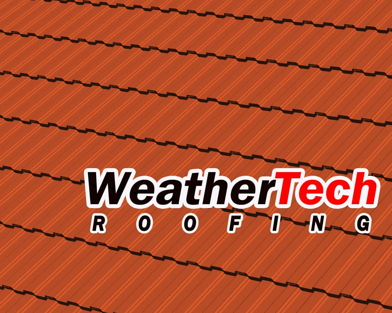 Pitched roof with terracotta concrete tiles showing interlocking profile